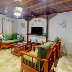 Air-conditioned suite with WiFi and a shared pool & terrace - walk to the beach