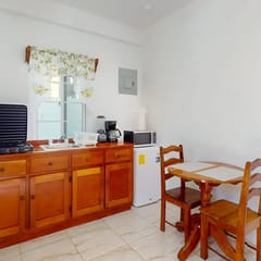Snug ground-floor haven with comfortable amenities and kitchenette