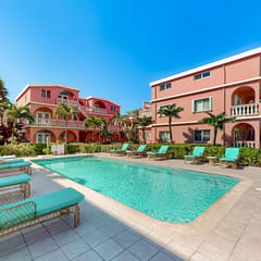 Two-story, ocean view condo w shared pool, two balconies, WiFi & partial AC