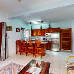 Peaceful dog-friendly condo w ocean view, shared pool, free WiFi & partial AC