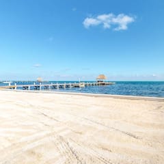 Family-friendly beachfront condo w shared pool & dock, sea view, WiFi & partial AC