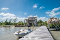 Spacious beachfront retreat with a soaking tub - pool, canoes, dock, & grill - Image 3