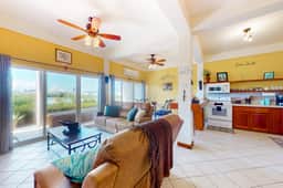 Vibrant, colorful lagoon-front suite with pool access, scenic patio, & WD - Image 3