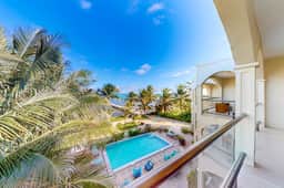 Serene oceanfront condo with shared pool, ocean view, WiFi, & partial AC - Image 4