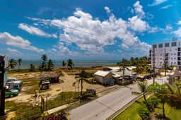 Steps from the sea apartment with shared pool & ocean-view balcony - Image 4