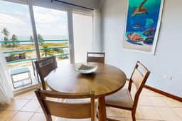 Steps from the sea apartment with shared pool & ocean-view balcony - Image 5