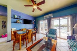 Cozy Waterfront Villa Home w Shared Pool, Water Views, WiFi, & AC - Walk to the Beach - Image 3