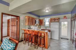 Cozy Waterfront Villa Home w Shared Pool, Water Views, WiFi, & AC - Walk to the Beach - Image 5