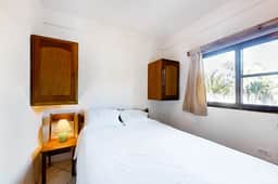 Affordable Suite with WiFi, Partial AC, Shared Rooftop Deck, Pool, and Grill - Image 2
