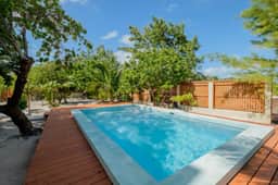 Beachfront abode with well-equipped kitchen - pool, beach, grill, & canoe access - Image 2
