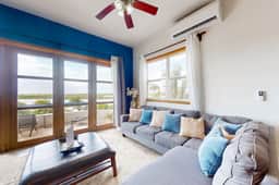 Tranquil apartment with modern amenities, and serene outdoor pool - Image 5