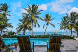 Beachfront condo with balcony, sea view, partial AC, pool, dock & kayaks - Image 4