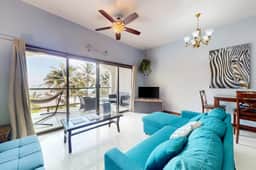 Beachfront condo with balcony, sea view, partial AC, pool, dock & kayaks - Image 5
