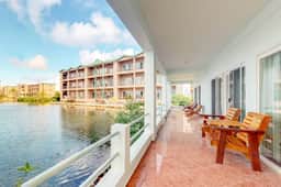 Beautiful lake-view villa with balcony, pool, & partial AC - near dining & shops - Image 3