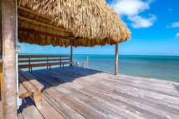 Tropical retreat villa with a pool, dock, bikes, canoes, balconies, and 360 views - Image 3