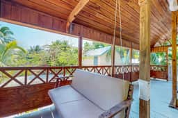 Comfortable home w casual island vibes, WiFi & partial AC - near the beach & town - Image 3