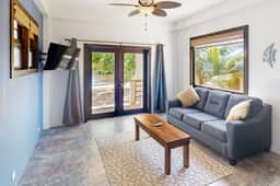 Beachfront suite with reef views - pool, bikes, canoes, dock, and grill access - Image 2