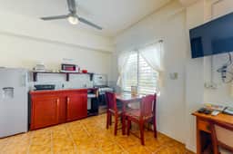 Bright studio w complimentary bikes, kitchen, picnic area, WiFi & partial AC - Image 2
