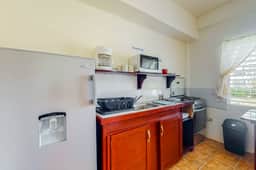 Bright studio w complimentary bikes, kitchen, picnic area, WiFi & partial AC - Image 3