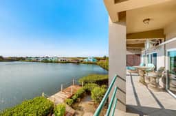 Comfortable condo with lagoon-view balcony, WiFi, AC & pool access - Image 3