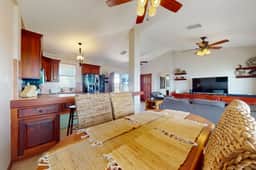 Sunny waterfront villa with outdoor pool, balcony, & AC - Image 5
