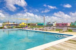 Sunny waterfront villa with outdoor pool, balcony, & AC - Image 2