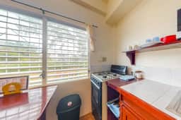 Hotel-style studio with kitchen, picnic area, free bikes, WiFi & partial AC - Image 3