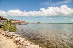 Waterfront resort villa with water views, balcony, full kitchen, & washer dryer - Image 3
