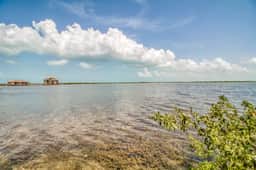 Waterfront resort villa with water views, balcony, full kitchen, & washer dryer - Image 5