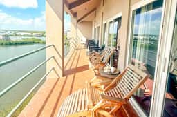 Lagoon-front suite with a balcony, breathtaking views, AC & a pool - Image 3