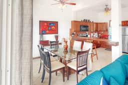 Stylish condo near the beach with pool, fast WiFi, partial ocean views & AC - Image 5