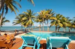 Oceanfront condo with pool, sea view, central AC & WiFi - steps to the beach - Image 2