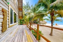 Romantic beachfront home w ocean views, dock, hammock, veranda & free WiFi - Image 2