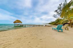 Romantic beachfront home w ocean views, dock, hammock, veranda & free WiFi - Image 3