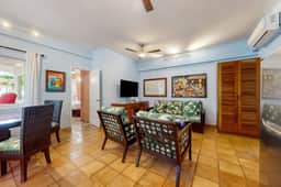 Tranquil ocean-view escape with shared pool, beach access, AC, & free wifi - Image 5