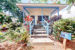 Cabana with a porch, hammock, & view of the pool & grilling area - Image 4