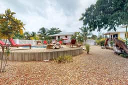 Wood cabana with a porch, pool view, WiFi, and a shared common area with grills - Image 4