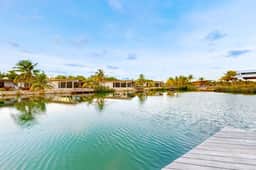 Waterfront villa with private pool, furnished deck & gas grill - Image 4