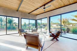 Waterfront villa with private pool, furnished deck & gas grill - Image 2