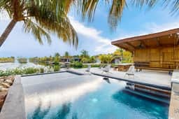 Water-view villa with plunge pool, private deck, full kitchen & partial AC - Image 4