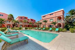 Beachfront dog-friendly condo with pool - walk to ocean from the veranda - Image 3
