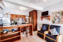 Beachfront dog-friendly condo with pool - walk to ocean from the veranda - Image 2