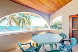 Family-friendly beachfront condo w shared pool & dock, sea view, WiFi & partial AC - Image 2