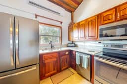 Family-friendly beachfront condo w shared pool & dock, sea view, WiFi & partial AC - Image 5