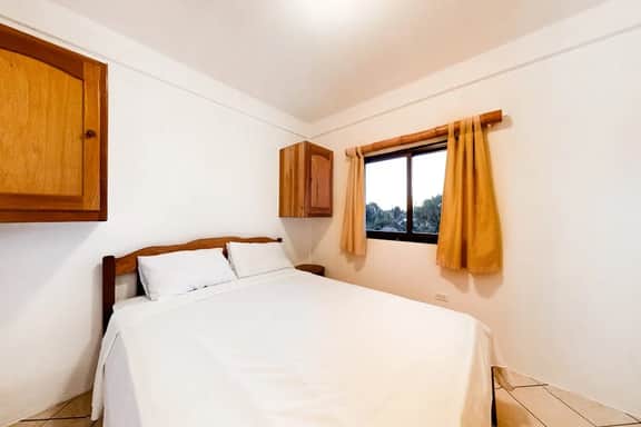 Cozy Suite for Two with WiFi, AC, Shared Pool, Grill & Sunsets from the Rooftop - Image 2