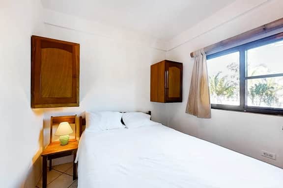 Affordable Suite with WiFi, Partial AC, Shared Rooftop Deck, Pool, and Grill - Image 2
