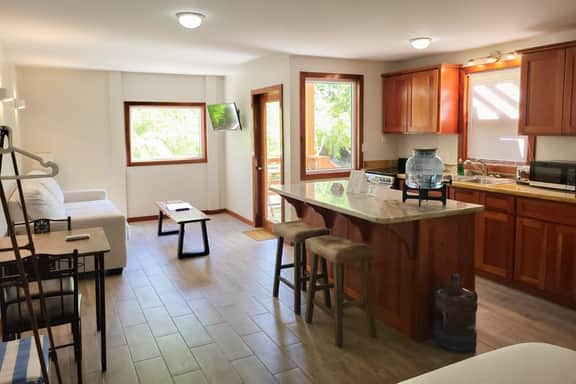Beachfront abode with well-equipped kitchen - pool, beach, grill, & canoe access - Image 5