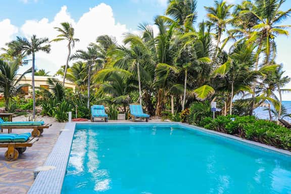 Beachfront condo with balcony, sea view, partial AC, pool, dock & kayaks - Image 3