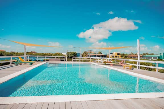 Beautiful lake-view villa with balcony, pool, & partial AC - near dining & shops - Image 4