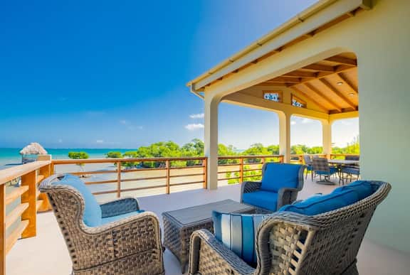 Tropical retreat villa with a pool, dock, bikes, canoes, balconies, and 360 views - Image 2